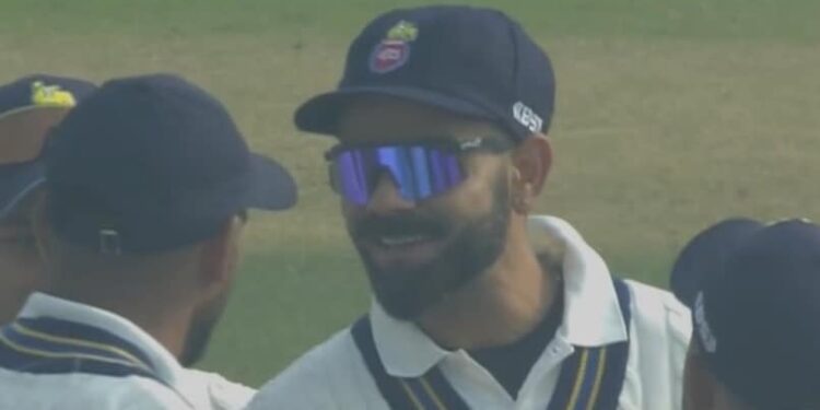 Virat Kohli in action, displaying his batting skills during a cricket match.